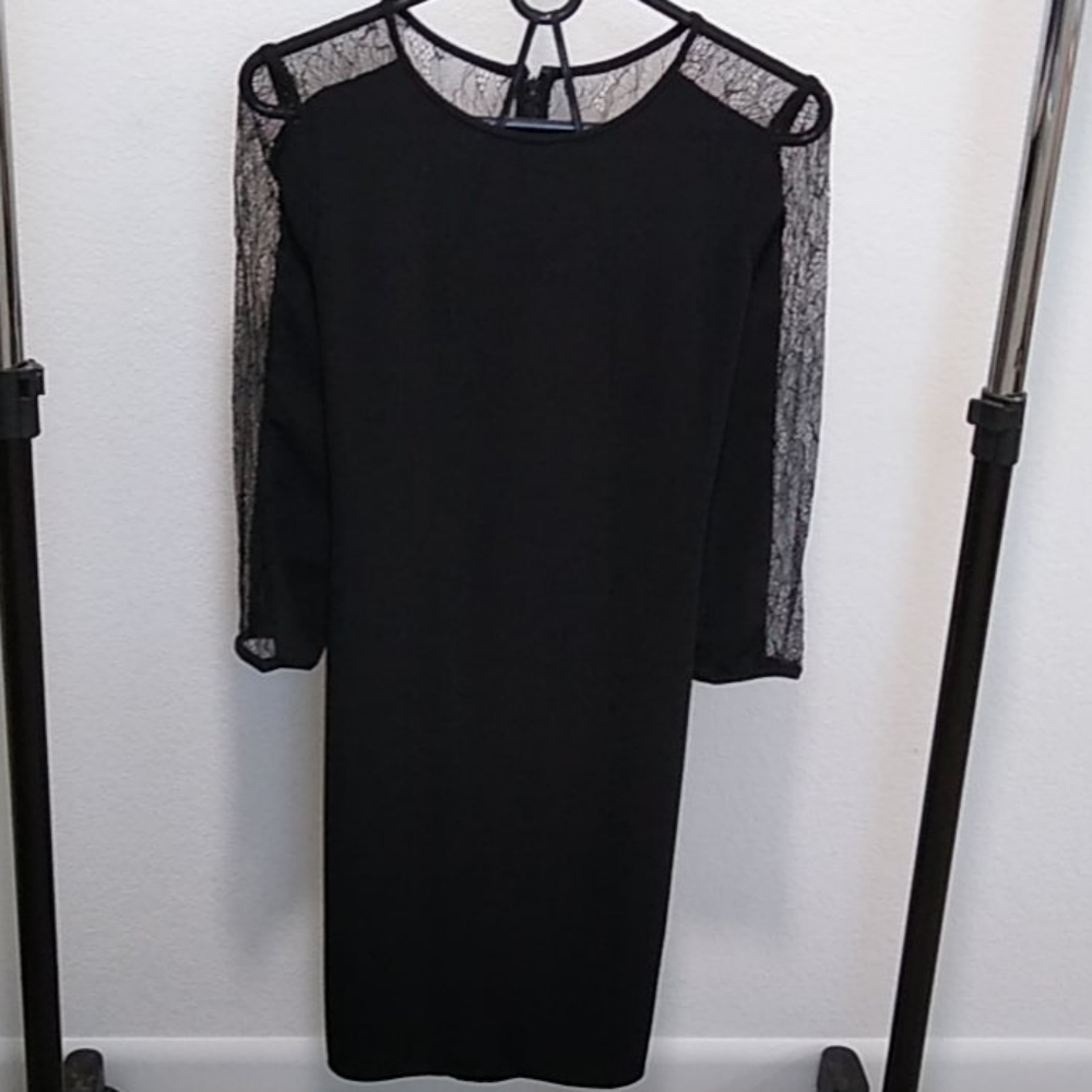 Black Calvin Klein dress with lace.